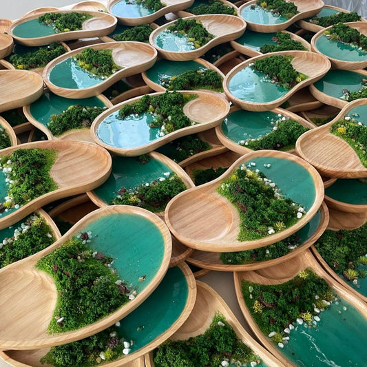 Collaborative Creation with Issey Miyake: Crafting Unique Raindrop-Shaped Wooden Trays Inspired by Tropical Rainforests
