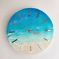 Green and blue ocean round clock